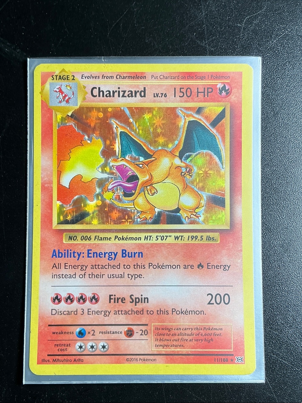 Charizard Holographic Pokémon Card - Red & Yellow